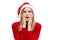Puzzled confused bewildered shocked amazed woman in santa claus hat . Comical reaction, emotion facial expression and