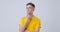 Puzzled Man with yellow t-shirt celebrating a brilliant idea