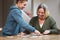 Puzzles are great for problem solving. a mother completing a puzzle with her son.