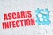 On the puzzles there is an inscription - Ascaris Infection, on a blue background pills.