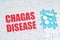 On the puzzles there is an inscription - Chagas disease, on a blue background pills.