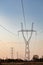 Pylon with insulatros and lines, wires. High voltage transmission line.