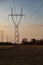 Pylon with insulatros and lines, wires. High voltage transmission line.