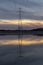 Pylon reflection on the Loughor estuary