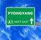 PYONGYANG road sign against clear blue sky