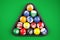 Pyramid balls pool billiard on green table. Top view. 3d illustration