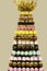 Pyramid of colorful various desserts. Sweets on the holiday. Edible decoration for events or weddings