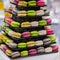 Pyramid of different french colorful macaroons various flavors and diffrent colors, french sweet cookies from almond