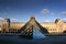 Pyramid of Louvre Museum in Paris France