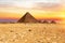 The Pyramid or Menkaure and the Pyramids of the queens at sunset, Giza, Egypt