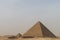 The pyramid of Menkaure with Queens Pyramids of Menkaure in the background