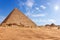 The Pyramid of Menkaure in sunny desert of Giza, Egypt