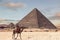 The Pyramid of Menkaure at sunset, is the smallest of the three main Pyramids of Giza, located on the Giza Plateau in the