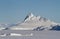 Pyramid prominent iceberg frozen in winter Antarctic