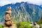 Pyramid of stones balancing with mountain background in Colca canyon in Peru