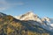 Pyramidal Alpspitze peak above forests in Wetterstein mountains