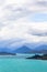Pyramidal mountains on the shores and islands on the lake. Wakatipu lake. South Island, New Zealand