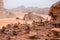 Pyramids of desires, pyramids of stones near the house of Lawrence of Arabia. In the background a desert landscape