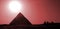 Pyramids at red sunset