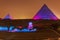 The Pyramids and the Sphinx in the night lights, Giza, Egypt