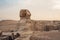 Pyramids and the Sphinx in twilight, evening view of Giza complex, Egypt