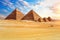 The Pyramids in the sunny desert of Giza, Egypt