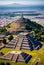 the pyramids of teotihuacan, mexico with foggy mountain on background