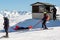 PYRENEES, ANDORRA - FEBRUARY 13, 2019: Rescuers at a ski resort provide assistance to the victim to take him to the