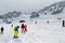PYRENEES, ANDORRA - FEBRUARY 6, 2018: Skiers stand on ski resort