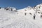 PYRENEES, ANDORRA - FEBRUARY 9, 2017: Unknown skiers on an alpine skiing slope in the Pyrenees, Andorra