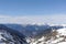 Pyrenees mountains range in winter with snowy peaks in Grandvalira ski paradise resort in Andorra