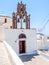 Pyrgos city view, Typical white santorini christian church. Santorini island view. Greece