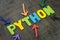 Python modern programming language for software development or application concept, multi color arrows pointing to the word Python