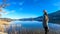 PÃ¶rtschach - A girl in a beanie walking along the lake side