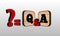 Q and A - acronym from wooden blocks with letters, questions and answers Q and A concept, 3D ilustration or 3D rendering.