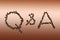 Q&A image made up of coffee beans.