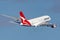 Qantas Airbus A380 large four engined passenger aircraft taking off from Sydney Airport