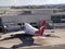 Qantas Airlines large plane rest at gate at SFO