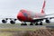 Qantas Boeing 747 jet taxis on the runway.