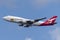 Qantas Boeing 747 jumbo jet commercial airliner taking off from Sydney Airport with a special boxing kangaroo livery