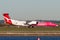 QantasLink Qantas deHavilland DHC-8 Dash 8 twin engined regional airliner aircraft at Sydney Airport.