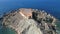 Qarraba Bay aerial flying off the cliff towards flat rock view point Malta