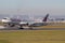 Qatar Airways Airbus A350 taking off in Vienna with industry