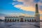 Qatar Grand Mosque exterior view at sunset with clouds in the sky