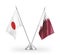 Qatar and Japan table flags isolated on white 3D rendering