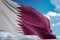 Qatar national flag waving blue sky background realistic 3d illustration