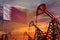 Qatar oil industry concept. Industrial illustration - Qatar flag and oil wells with the red and blue sunset or sunrise sky backgro