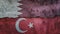 Qatar and Turkey flag on cracked wall background. Economics, politics conflicts, war concept texture background