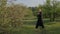 Qigong master Wushu Taijiquan practices tai Chi in the Park and does exercises