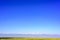 In Qinghai province of China, blue sky, grassland and snow-capped mountains constitute a beautiful picture